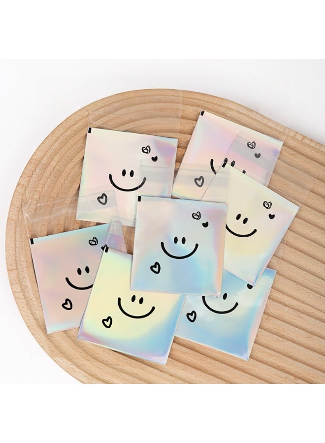 RTYY 100 كيس لاصق ذاتي للبسكويت، أكياس سيلوفان قابلة لإعادة الإغلاق، أكياس بلاستيكية مزينة بتعبيرات لطيفة لخبز البسكويت والحلوى، أكياس بلاستيكية شفافة للحلويات، أكياس تغليف فردية للحلوى، أكياس سيلوفان لتوزيعات الحفلات، لتغليف البسكويت والشوكولاتة والوجبات الخفيفة والمخبوزات (10 × 10 سم). - Image 3